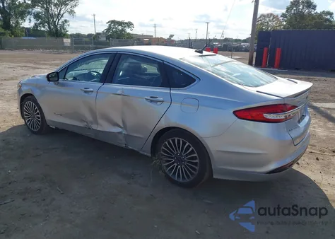 2017 Ford Fusion Hybrid Titanium z USA, uszkodzony, nr VIN 3FA6P0RU7HR196032